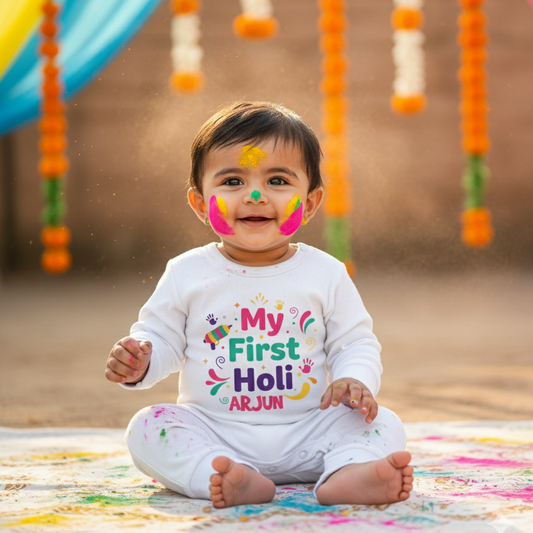 Baby wearing a 'My First Holi Arjun' onesie with colorful decorations.