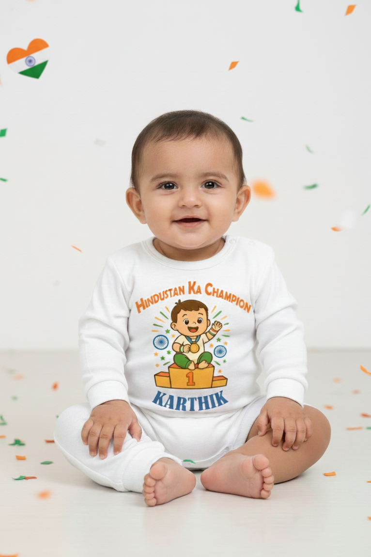 Baby wearing a white onesie with colorful text and graphics on a light background