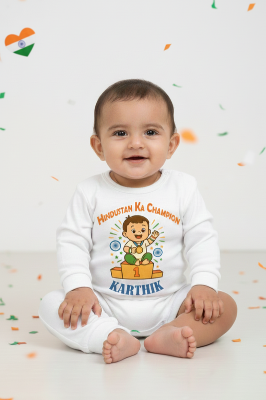 Baby wearing a white onesie with colorful text and graphics on a light background